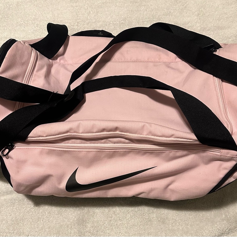 Nike Light Pink Duffel Bag with Black Straps